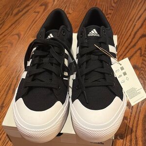Adidas Women’s Black and White Platform Sneakers